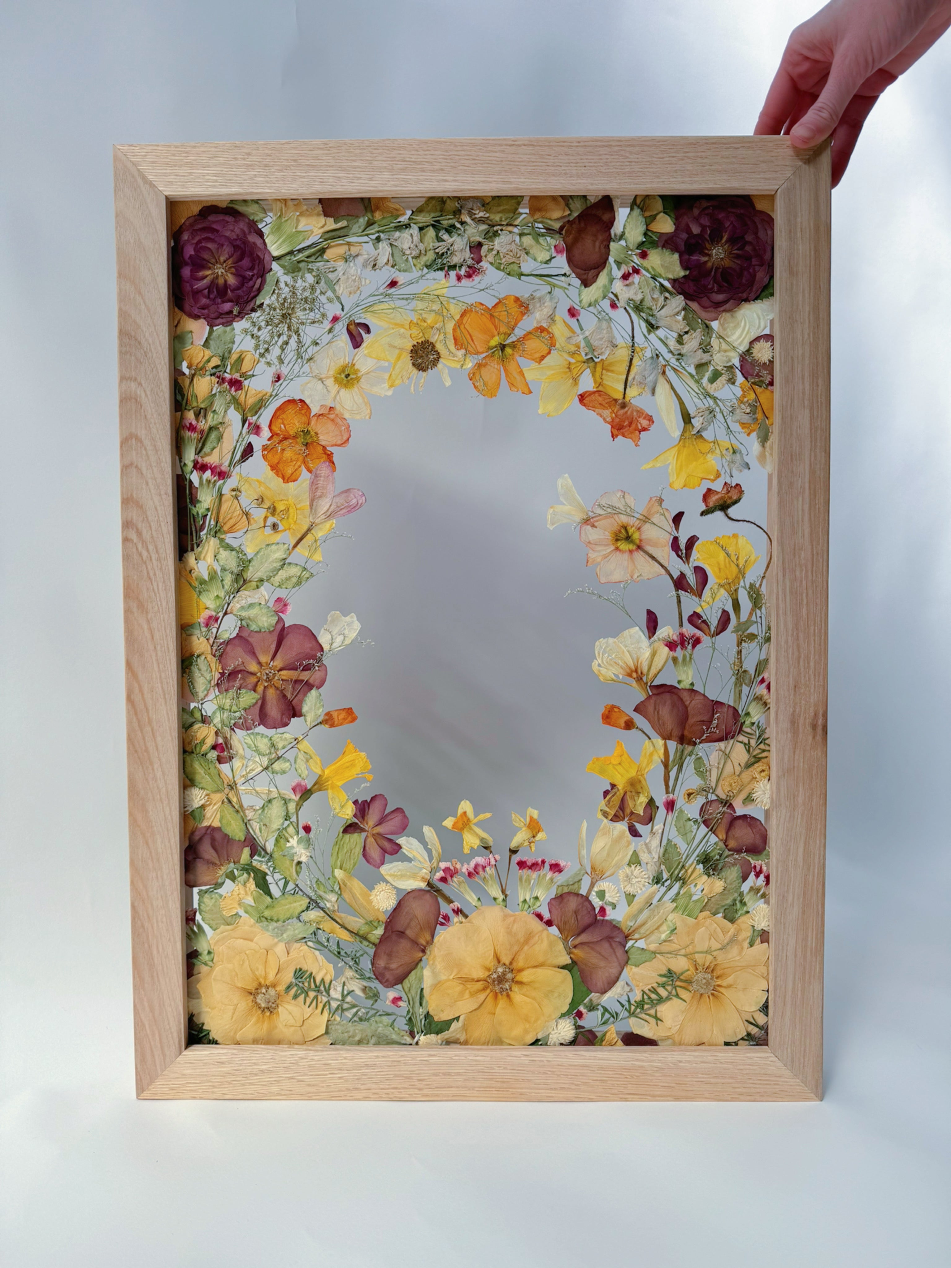 Pressed flower fine artwork in a whimsical intricate custom pressed flower frame made with a preserved wedding bouquet. Glass and oak frame floral artwork. Australias best flower preservation artist. Secret garden inspired design. Pressed roses, poppies, tulips, cosmos flowers