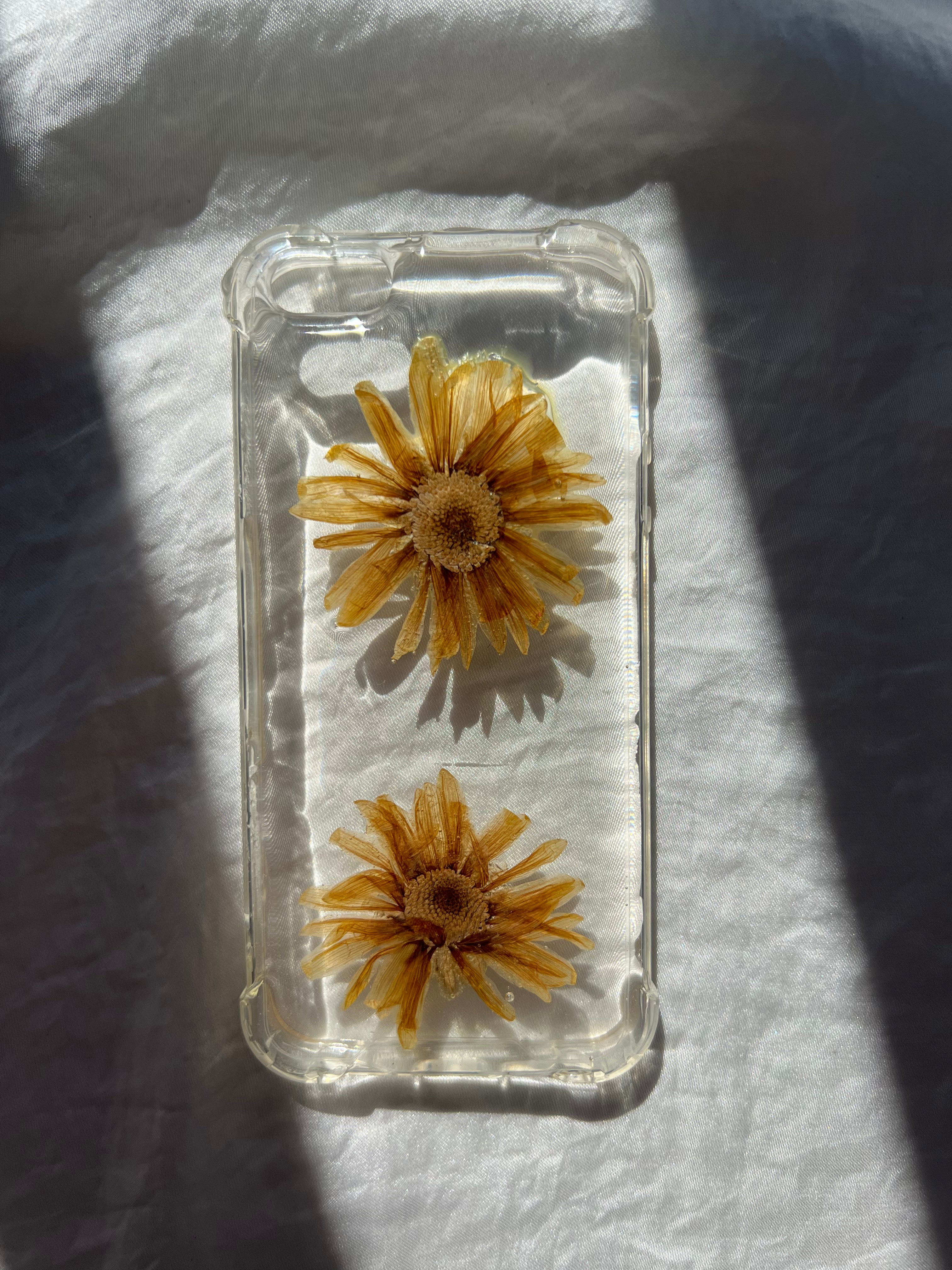 Pressed flower phone case for the iphone SE made with yellow daisies pressed flower phone case, botanical phone case, pressed flower art, handmade phone case, real pressed flowers, australian made, botanical art, pressed flower artist, floral art, botanical preservation, resin and flowers, flowers in resin, phone accessories, 